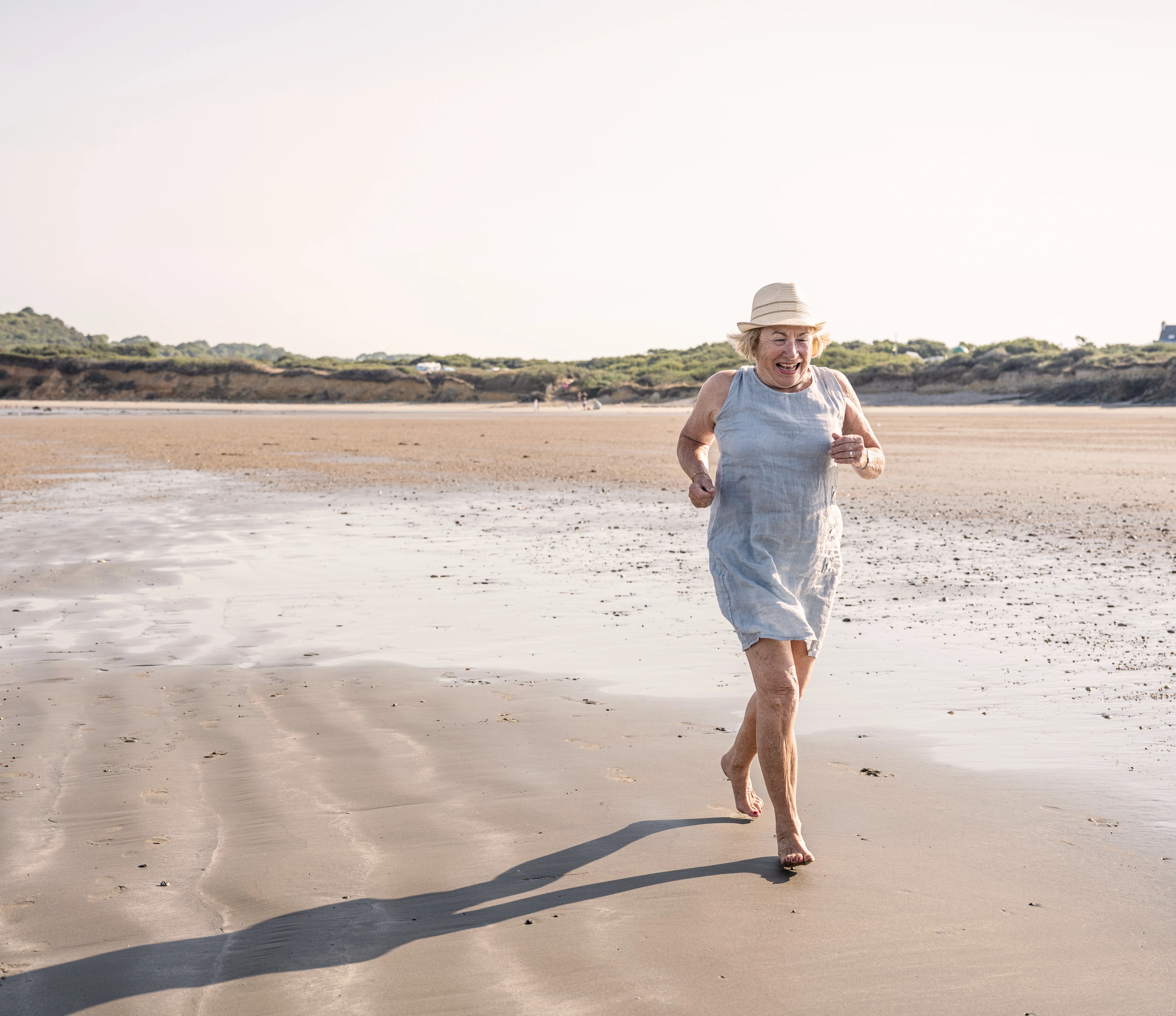 Woman running on beach