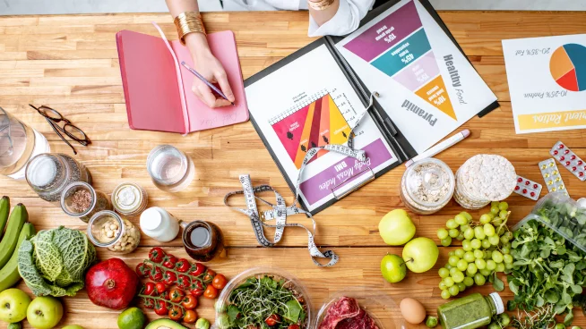 a table with food and a menu