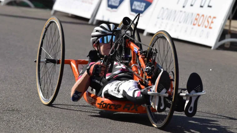 Edie competing in bike race